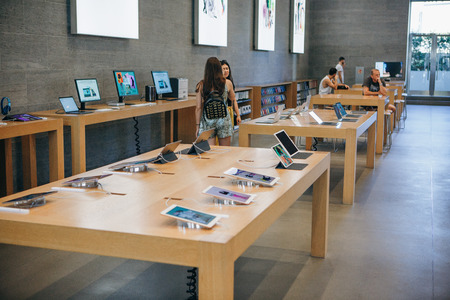 Berlin, August 29, 2018: Sale of Apple products in the official Apple Store in Berlin. People will choose modern gadgets for shopping for themselves and for gifts.のeditorial素材