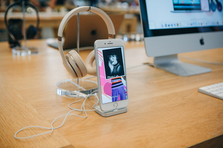 Berlin, August 29, 2018: Sale of Apple products including iPhone 8 plus and headphones for listening to music in the official Apple Store in Berlin.のeditorial素材