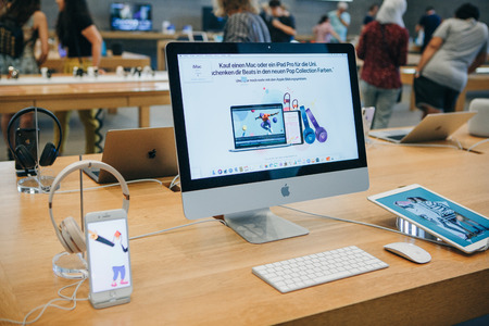Berlin, August 29, 2018: Sale of Apple products in the official Apple Store in Berlin. People will choose modern gadgets for shopping for themselves and for gifts.のeditorial素材