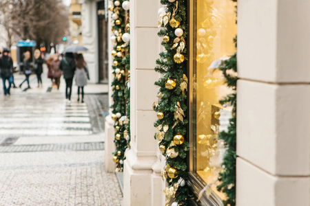 Christmas decorations shop windows in Prague in the Czech Republic during the Christmas holidays. City street.の写真素材