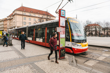 Prague, December 25, 2017 The tram arrived at the tram station and got ready to leave. Daily city lifeのeditorial素材