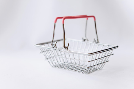 Empty basket for products and goods on a white background.の写真素材