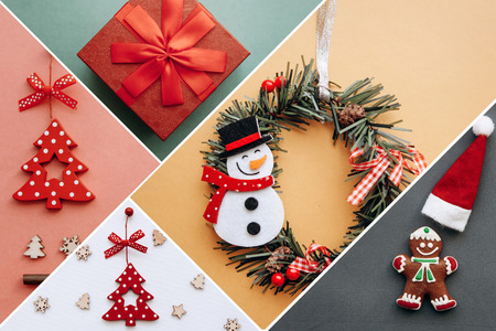 Creative idea various Christmas toys and things on multi-colored backgrounds. Celebration of Christmas and New Year. My idea and artwork.の写真素材