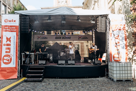 Germany, Muenster, October 5, 2018: Street rock concert on the main square of the city during the festive event.のeditorial素材
