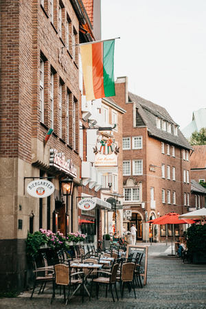 Germany, Muenster, September 25, 2018: Cafe in the city street waiting for visitorsのeditorial素材