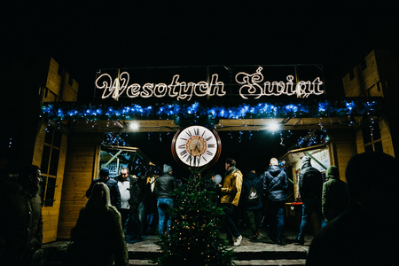 Warsaw, December 31, 2017: Christmas market in Warsaw in the evening. Christmas celebration in Europe.のeditorial素材