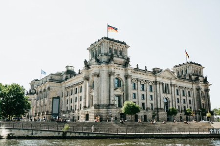 Beautiful view of the Reichstag building on a sunny summer day. One of the attractions of Berlin in...
