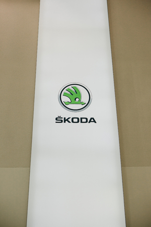 Berlin, August 29, 2018: The sign or banner of Skoda on the wall at the exhibition Drive - Volkswagen groups forum in Berlin.のeditorial素材