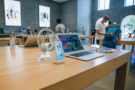 Berlin, August 29, 2018: Sale of Apple products in the official Apple Store in Berlin. People will choose modern gadgets for shopping for themselves and for gifts.のeditorial素材