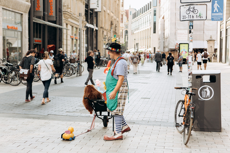 Germany, Leipzig, September 6, 2018: Clown on a city street. Entertainment of tourists and localsのeditorial素材