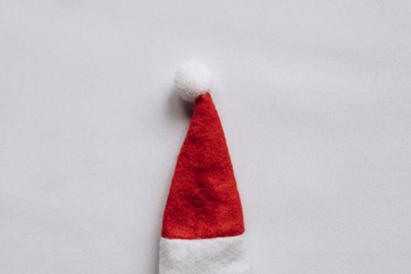 Christmas or New Year concept in minimal style - Santa Claus hat. Minimalism.の写真素材