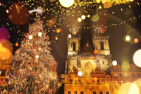 Decorated Christmas tree stands on the main square in Prague during the New Year holidays.の写真素材