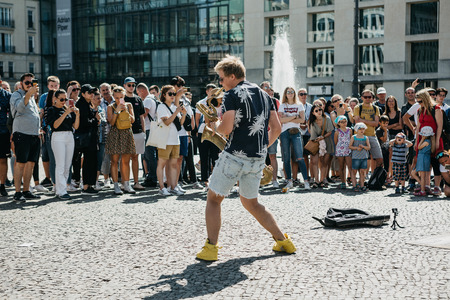 Germany, Berlin, September 05, 2018: A group called Blowing Doozy plays jazz on the square next to the Brandenburg Gate. A musical performance for tourists and locals.のeditorial素材