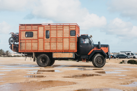 Portugal, Lagos, 12 April 2018: People travel in a truck with a motor home. Car for traveling. The photo was taken on the southern coast of Portugal.のeditorial素材