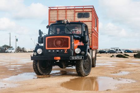 Portugal, Lagos, 12 April 2018: People travel in a truck with a motor home. Car for traveling. The photo was taken on the southern coast of Portugal.のeditorial素材