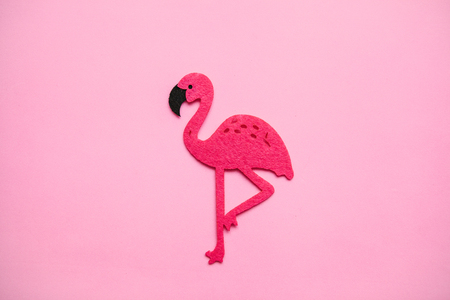 Red flamingo on a pink background in minimal style.の写真素材
