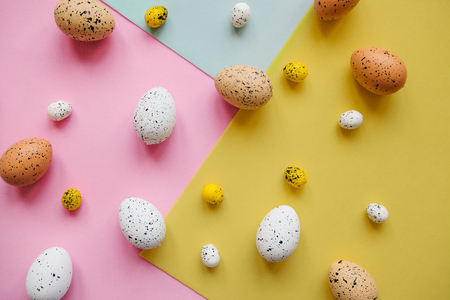 A lot of colorful Easter eggs on the colorful background. Festive Easter background.の写真素材