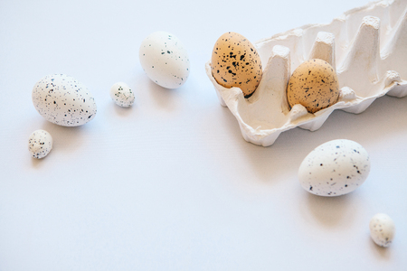Set of eggs on a white background. Festive Easter background. Nearby there is a place for text.の写真素材