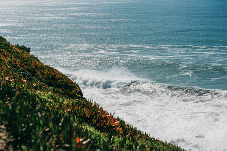 Beautiful view of the Atlantic Ocean from the western point on Cape Roca in Portugal.の写真素材