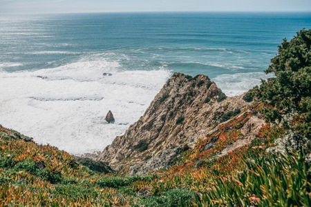 Beautiful view of the Atlantic Ocean from the western point on Cape Roca in Portugal.の写真素材