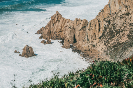 Beautiful view of the Atlantic Ocean from the western point on Cape Roca in Portugal.の写真素材