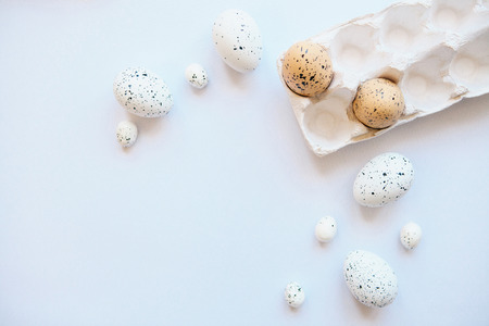 Set of eggs on a white background. Festive Easter background. Nearby there is a place for text.の写真素材