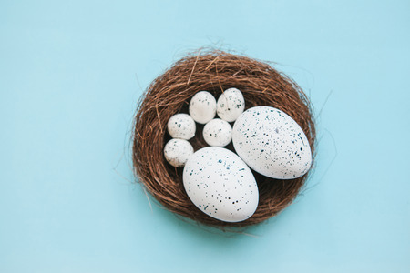 Traditional Easter eggs on a blue background. Easter celebration background.の写真素材