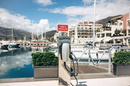 Montenegro, Tivat, April 9, 2019: Modern Tesla electric filling station in the port of Porto Montenegro for refueling electric cars and vehicles.のeditorial素材