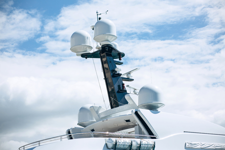Part of the ship or vessel or yacht against the blue sky. Concept of summer sea vacation or cruise.の写真素材