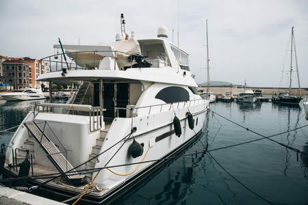 Beautiful view of the yacht in port Lustica Bay in Montenegroの写真素材