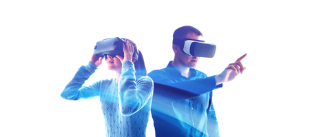 A man and a woman in glasses of virtual reality. The concept of modern technologies and technologies of the future. VR glasses.の写真素材
