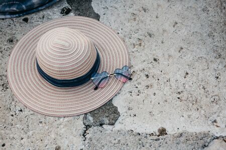 Womens hat and sunglasses top view. Summer concept.の写真素材