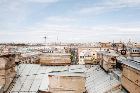 Beautiful top view of the roofs of authentic houses in St. Petersburg in Russia.の写真素材