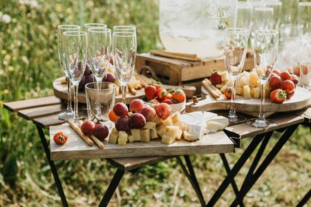 Picnic in nature or eating out. Preparing to celebrate events or catering.の写真素材