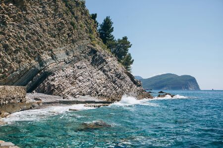 Beautiful view of the natural landscape with the sea and cliffs in Montenegro near Petrovac.の写真素材