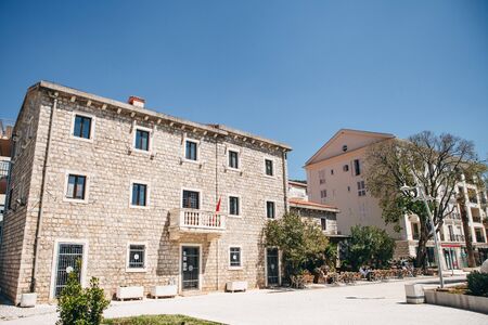 View of a typical apartment building in Petrovac in Montenegro.の写真素材