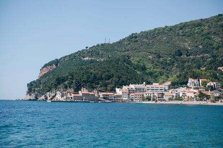 Beautiful view of the coastal resort town of Petrovac in Montenegro.の写真素材
