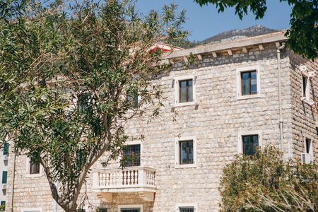 View of a typical apartment building in Petrovac in Montenegro.の写真素材