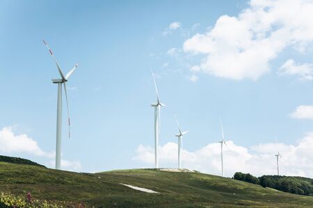 View of the natural landscape and windmills in Montenegro. Eco-friendly energy or alternative energy sources.の写真素材