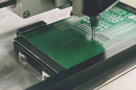 Automated manufacturing process for boards or microchips for electronics or computers.の写真素材