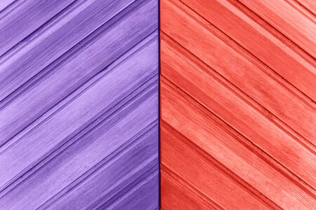 Wooden surface or door in living coral and ultraviolet colors. Two trend colors of 2018 and 2019.の写真素材