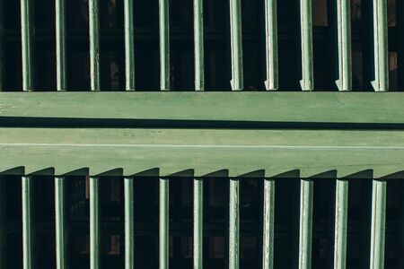 Closeup of green old or vintage shutters for closing windows.の写真素材
