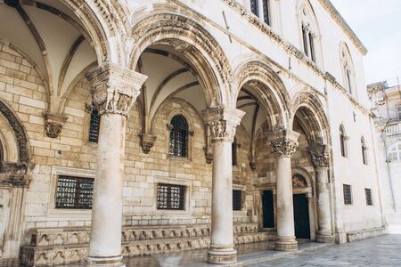 Beautiful view of an old building with columns in Dubrovnik in Croatia. European ancient architecture.の写真素材