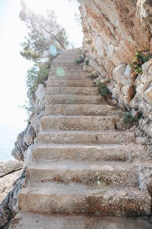 Beautiful stone staircase among the rocks upの写真素材