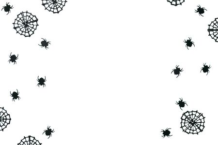 Black spiders and spider web on a white background. Halloween celebration background.の写真素材