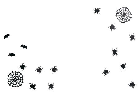 Black spiders and cobweb and bats on a white background. Halloween celebration background.の写真素材