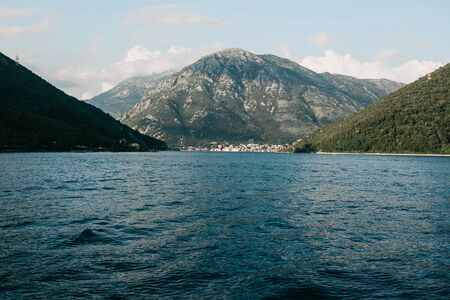 Boko Kotor Bay. Beautiful sea and mountain views of the natural landscape and coastal city in Montenegro.の写真素材