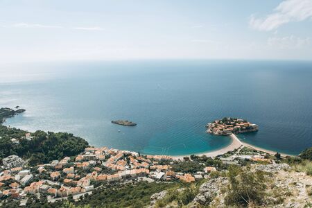 Beautiful view of the sea, the coastal city and the island   in Montenegro.の写真素材