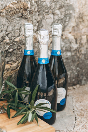 Italy, Venice, September 15, 2019: Prosecco wine bottles in a row. Popular Italian alcoholic drink.のeditorial素材