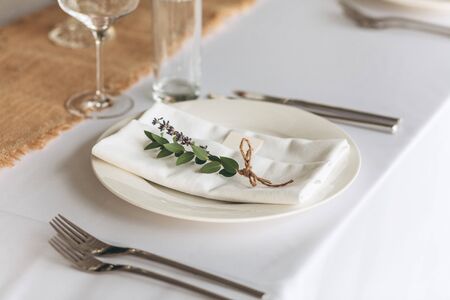 Plate, fork and knife. Table setting for a festive event.